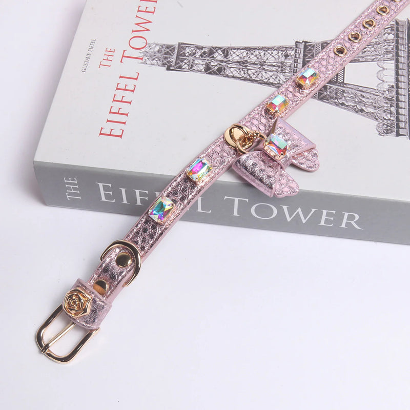 Purple AB crystal butterfly bow leather dog collar on Eiffel Tower book