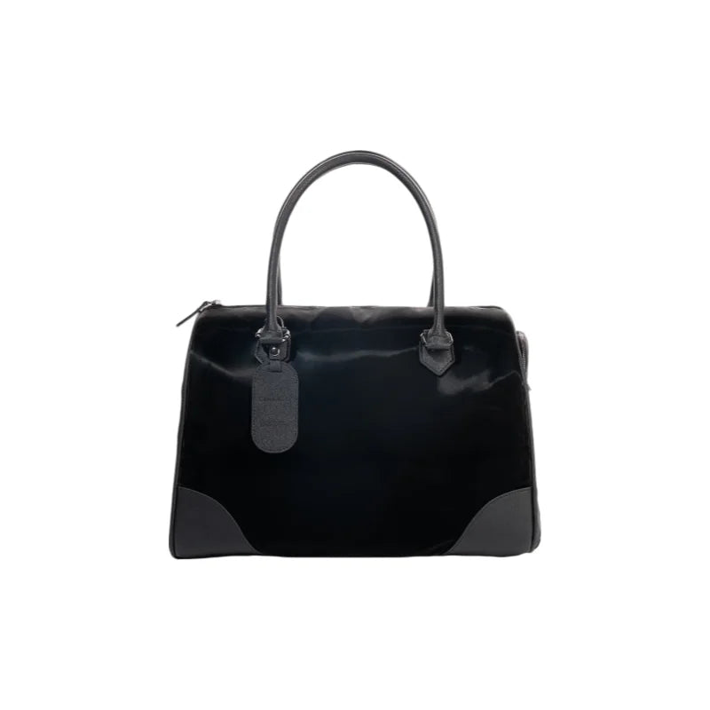 Black glossy Boston bag with dark gray accents and gunmetal hardware