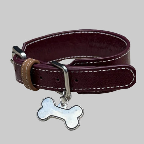 Burgundy leather collar showing contrast white stitching and craftsmanship