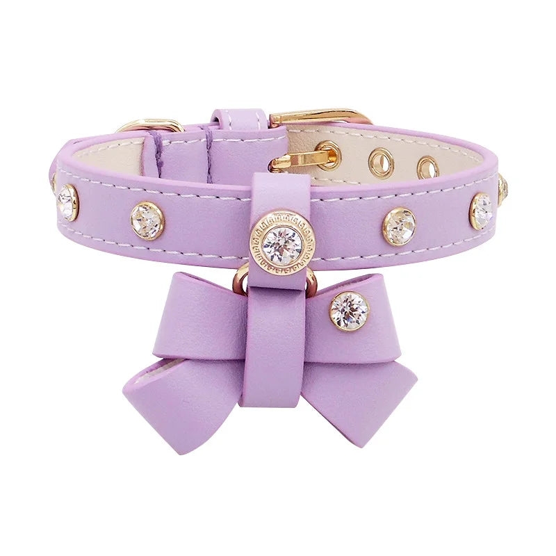 Green leather pet collar flat lay showing full length and bow attachment