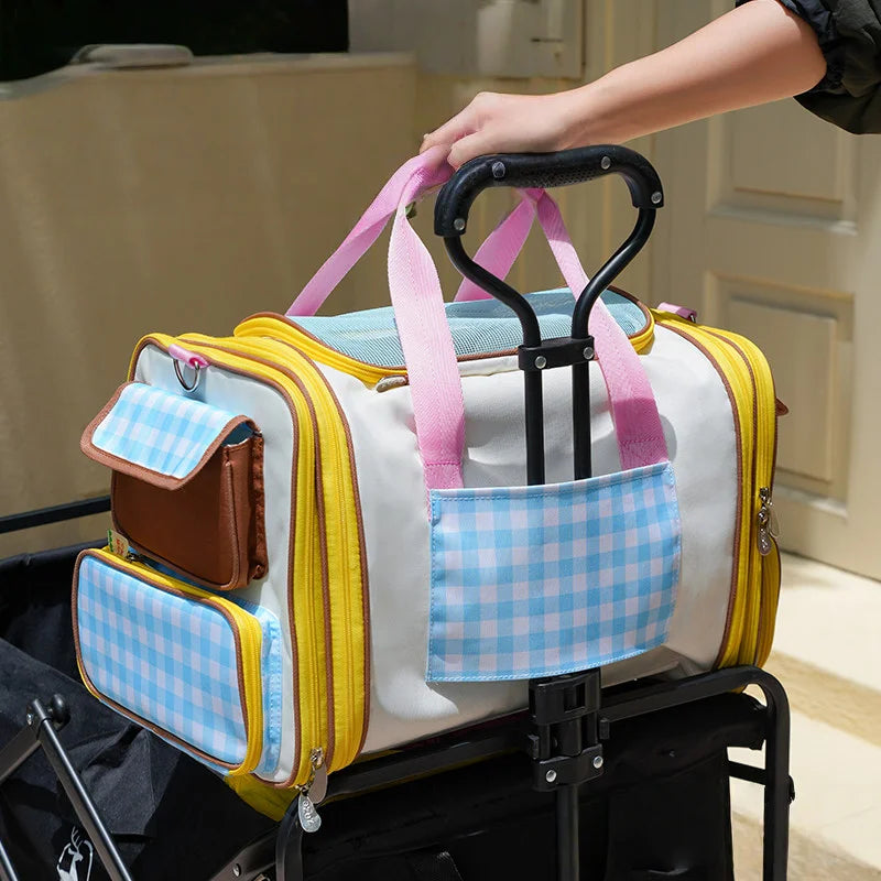 Pet travel bag being carried as crossbody shoulder bag with dog inside