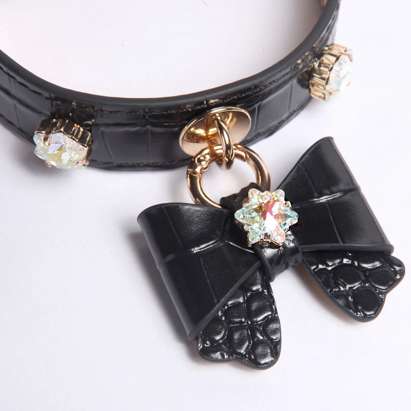 Side view of snowflake bow collar showing adjustable buckle and D-ring