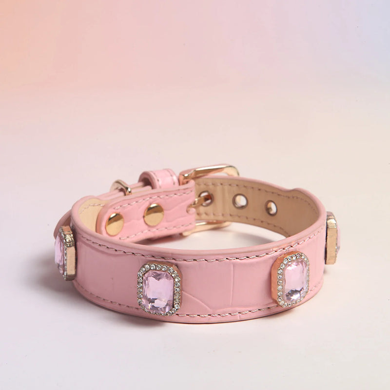 Pink genuine leather dog collar with matching pink square crystals and rhinestone halos on dog